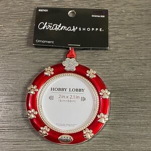 Hobby Lobby Red and Silver Paw Print Metal Ornament